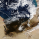 Illustration for article titled Shocking NASA Satellite Photos Reveal Large Area Covered in Black Smoke Caused by Oil Fires